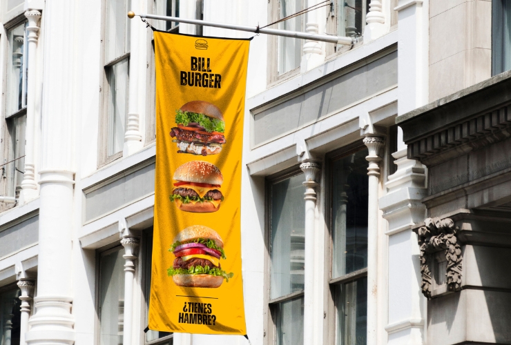 Instalación lona publicitaria fachada restaurante